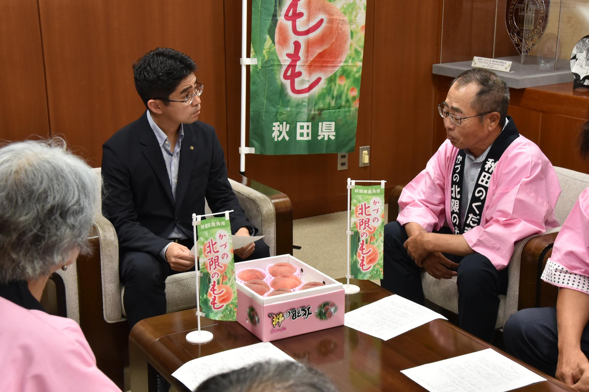桃の生育状況報告の様子